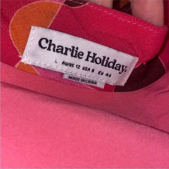 CHARLIE HOLIDAY NWT CATALINA 2 piece TOP AND SKIRT ABSTRACT SWIRL
PINK SIZE 8 - Picture 13 of 14